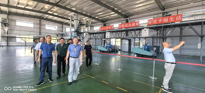 湘赣边区墟落振兴树模区油茶全工业链专家效劳团莅临我司考察-(4).jpg